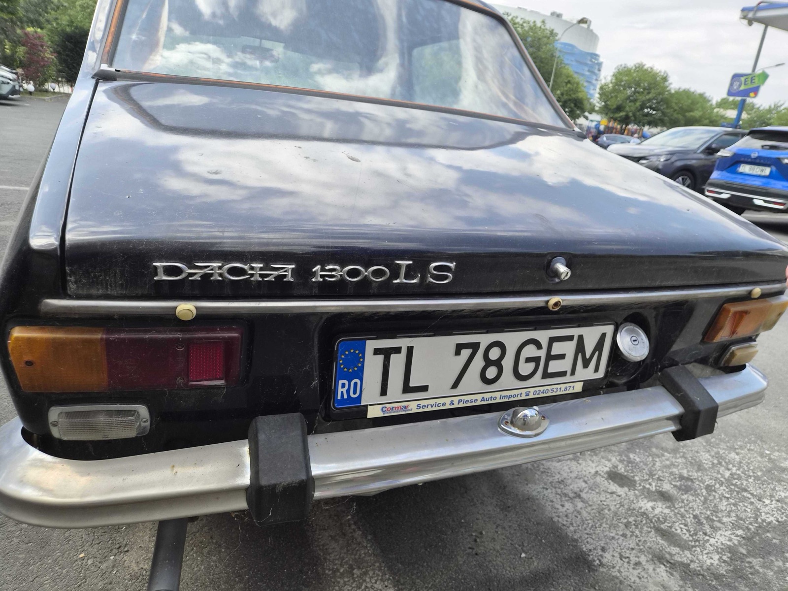 Chrome DACIA 1300 LS badge on the boot lid of the same car